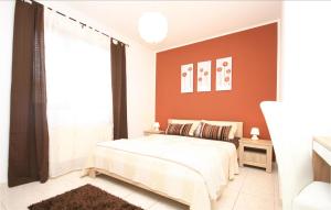 En eller flere senge i et værelse på Apartment Vodice 19