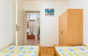 Posteľ alebo postele v izbe v ubytovaní Lovely Apartment In Fazana With Kitchen