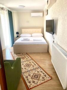 Postel nebo postele na pokoji v ubytování Oasis