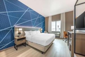 Ένα ή περισσότερα κρεβάτια σε δωμάτιο στο Comfort Inn & Suites Belton Temple South I-35