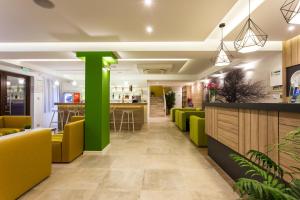 Vstupní hala nebo recepce v ubytování Hotel Compliment