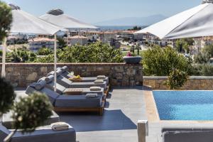 Posezení v ubytování Akrolithos Luxury Suites & Spa + 25 fotografií
