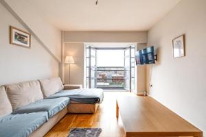 Μια τηλεόραση ή/και κέντρο ψυχαγωγίας στο Large 2 Bed 2 Bath Central Manchester