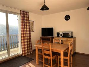 TV a/nebo společenská místnost v ubytování Résidence Hameau De Balestas Mp - T2/4pers BELLE SAYETTE 121-Peyresourde MAE-0084