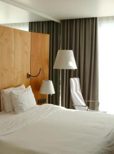 Postel nebo postele na pokoji v ubytování Holiday Inn - Tbilisi by IHG
