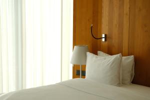 Postel nebo postele na pokoji v ubytování Holiday Inn - Tbilisi by IHG