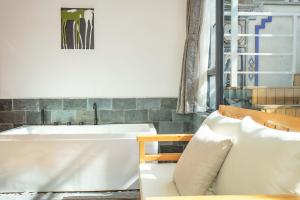 Posezení v ubytování Dali Jishi Hotel