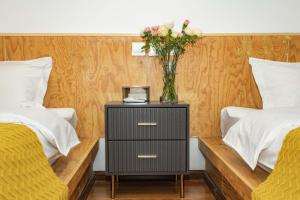 Postel nebo postele na pokoji v ubytování Dali Jishi Hotel