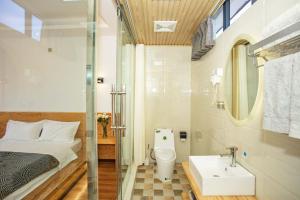 Koupelna v ubytování Dali Jishi Hotel