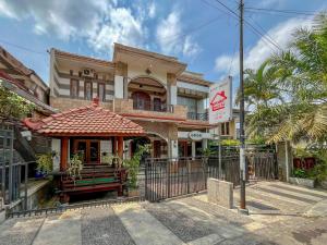a building with a no entry sign in front of it at RedDoorz Near Alun Alun Kota Wisata Batu in Batu