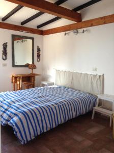 Säng eller sängar i ett rum på Villa "Ai Galli"