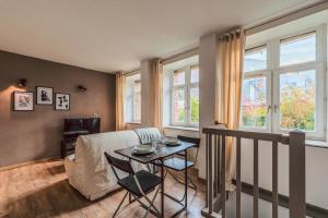 Posezení v ubytování Duplex en cave voutée au coeur de Douai