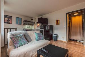 Posezení v ubytování Duplex en cave voutée au coeur de Douai