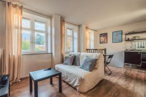 Posezení v ubytování Duplex en cave voutée au coeur de Douai