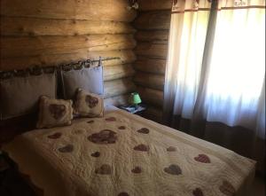 Postel nebo postele na pokoji v ubytování Chalet Le Mélèze