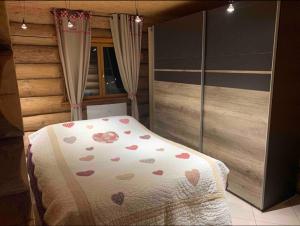 Postel nebo postele na pokoji v ubytování Chalet Le Mélèze