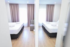 Voodi või voodid majutusasutuse Luxury Rooms Pojta toas