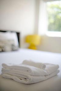 Katil atau katil-katil dalam bilik di Just Steps Away From Hampton Beach