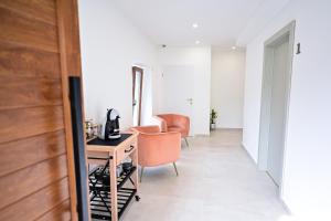 Televiisor ja/või meelelahutuskeskus majutusasutuses Luxury Rooms Pojta
