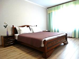 Ліжко або ліжка в номері Inndays Apartments na Lunacharskogo