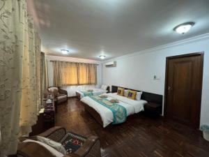 Letto o letti in una camera di Sherpa Home Hotel