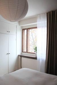 En eller flere senge i et værelse på Tilava saunallinen kolmio