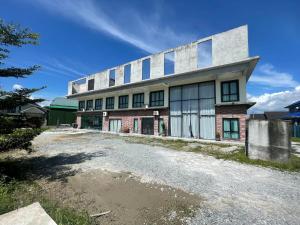 an external view of a building with a lot of windows at MKB Homestay - Queen bed Studio Room with view & free parking in Shah Alam