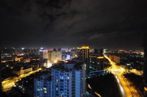 Nespecifikovaný výhled na destinaci Kchun-ming nebo výhled na město při pohledu z apartmánu + 9 fotografií