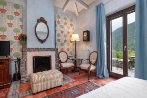 Posedenie v ubytovaní Ostra Menalon Luxury Suites