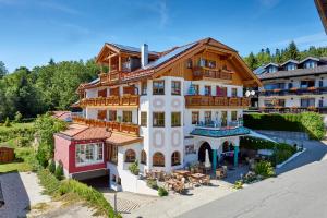 an aerial view of a large building with a patio at Hotel Brunnenhof in Bayerisch Eisenstein