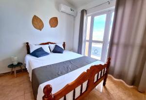 Photo de la galerie de l'établissement Bel appartement à 10mn à pied de la plage - Adelaar Penthouse, à Pereybere