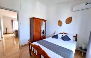 Photo de la galerie de l'établissement Bel appartement à 10mn à pied de la plage - Adelaar Penthouse, à Pereybere