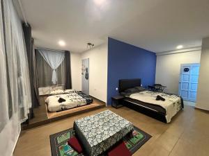 Postel nebo postele na pokoji v ubytování Hotel Lavie at Centrum