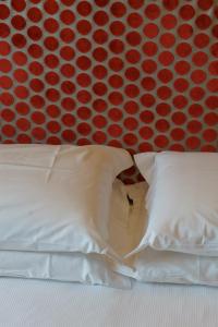 Postel nebo postele na pokoji v ubytování Hotel Hermitage