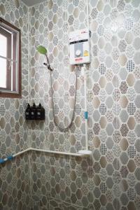 a bathroom with a shower with a shower at Home in Tambon Hai Ya, 4 minutes walk to Old City by NNTH Home cnx in Chiang Mai +66 photos