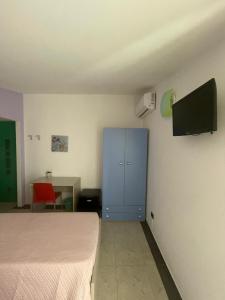 TV a/nebo společenská místnost v ubytování B&B Le Terrazze