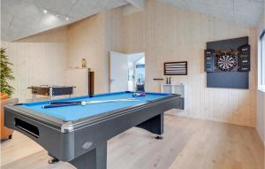 a billiard room with a blue pool table at Awesome Home In Sydals With Sauna in Sarup