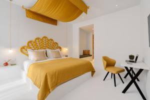 Cama ou camas em um quarto em Croco Mykonos