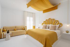 Cama ou camas em um quarto em Croco Mykonos