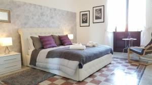 Cama o camas de una habitación en House Sant'Angelo great view