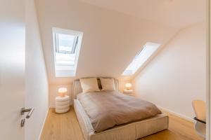 Postel nebo postele na pokoji v ubytování Modernes Apartment in Langenbach bei München, nahe Flughafen München