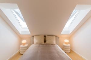 Postel nebo postele na pokoji v ubytování Modernes Apartment in Langenbach bei München, nahe Flughafen München