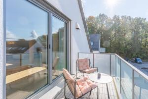 Balkón nebo terasa v ubytování Modernes Apartment in Langenbach bei München, nahe Flughafen München
