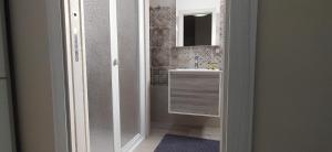 Koupelna v ubytování Giliberto Rooms