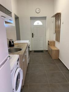 Kuchyň nebo kuchyňský kout v ubytování Mariyka Apartaments 2