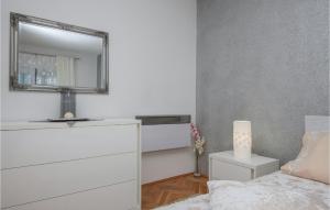 Postel nebo postele na pokoji v ubytování Holiday Home Prolozac Donji Ix