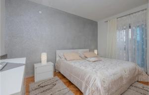 Postel nebo postele na pokoji v ubytování Holiday Home Prolozac Donji Ix