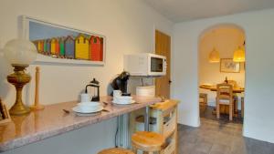 Köök või kööginurk majutusasutuses Robin Cottage