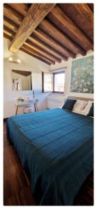 Postel nebo postele na pokoji v ubytování Vicolo Bugliolo 10 - HOME B&B