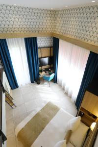 Postel nebo postele na pokoji v ubytování Splendid Hôtel & Spa